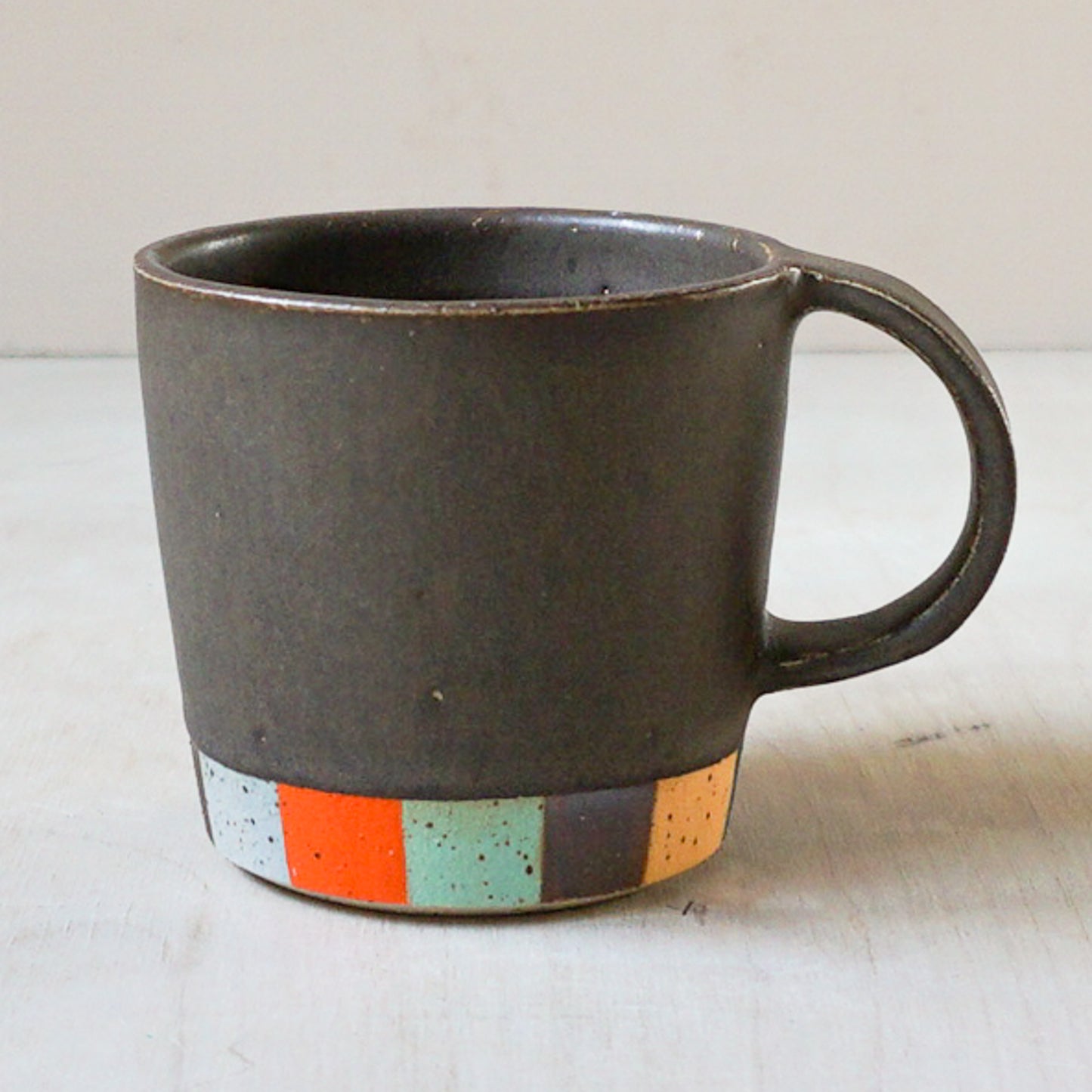 Tapered coffee cup in brown