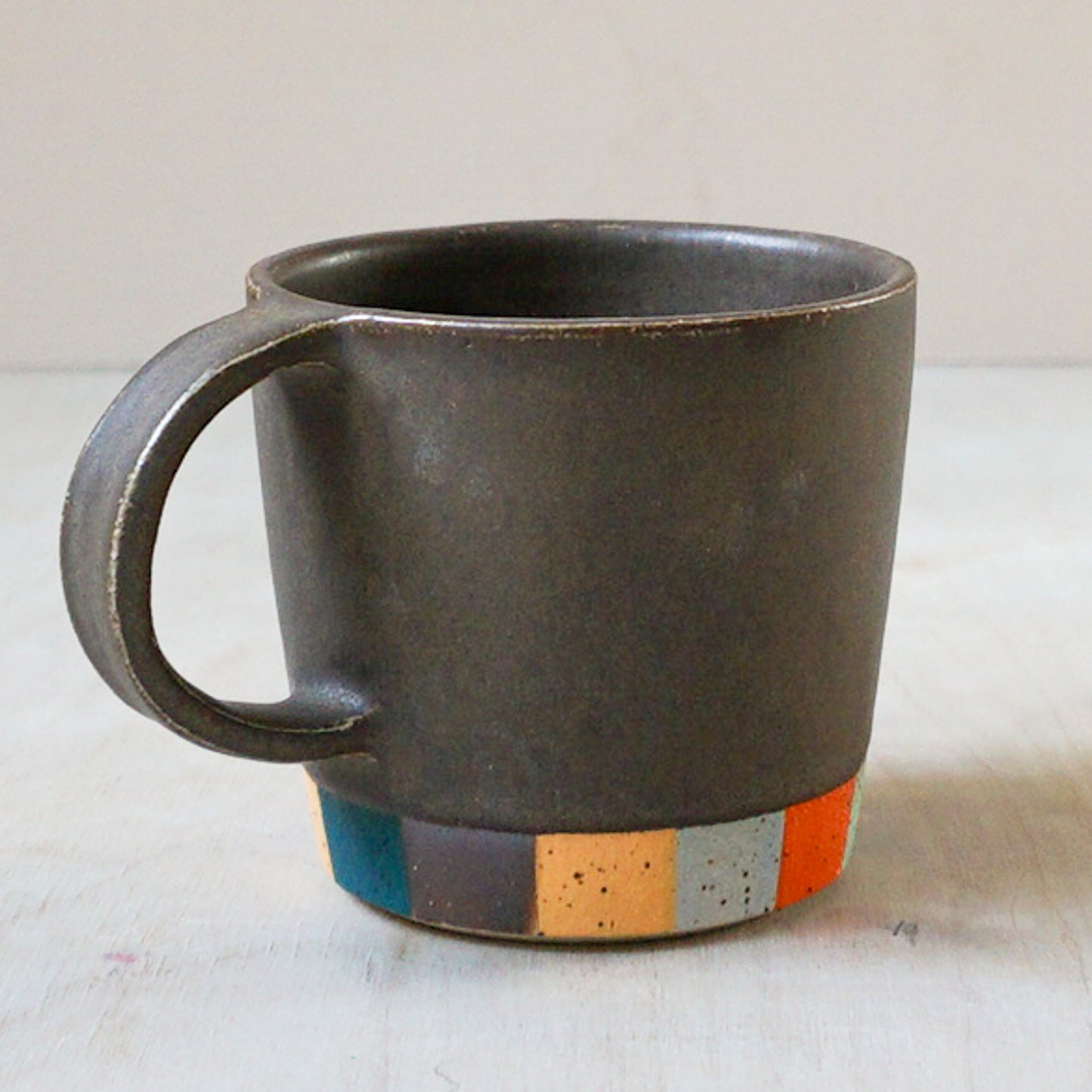 Tapered coffee cup in brown
