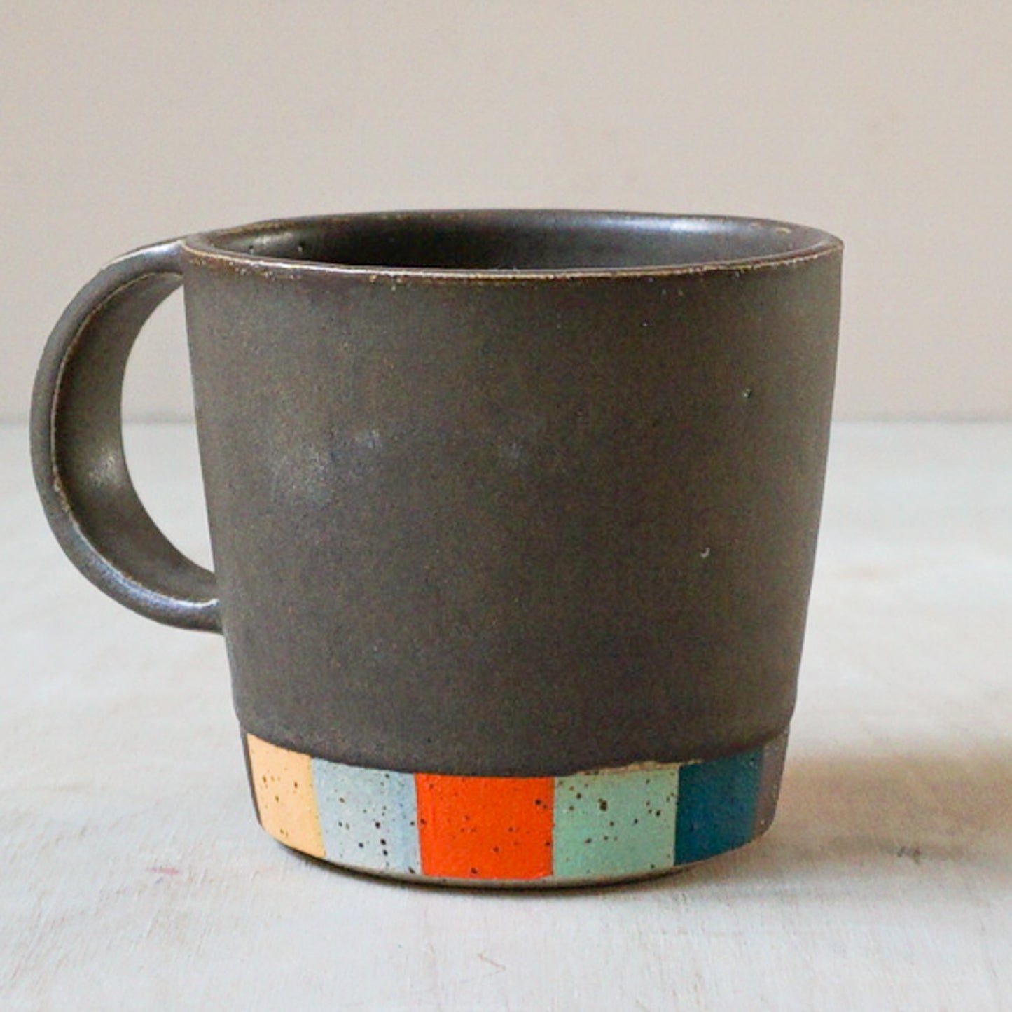 Tapered coffee cup in brown