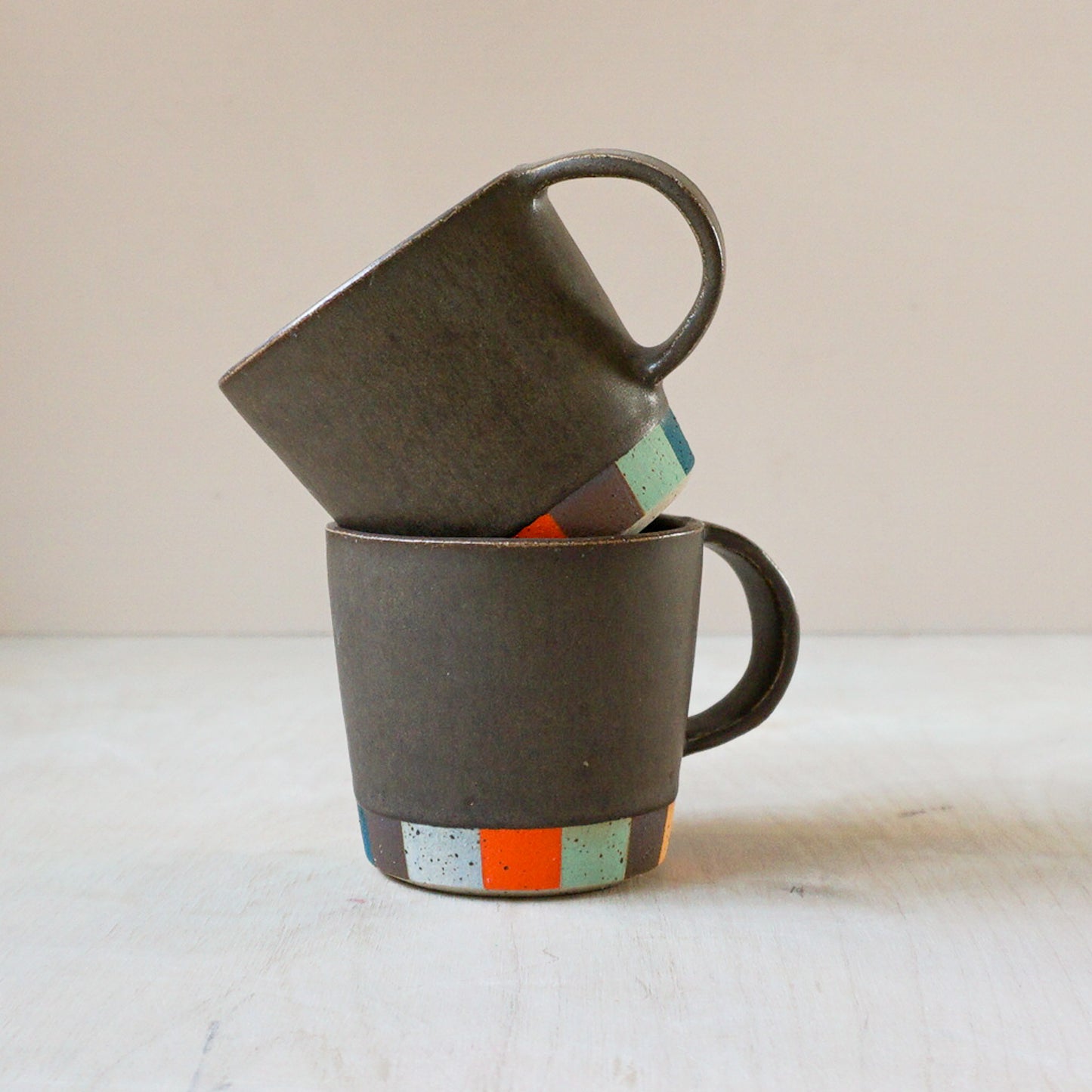 Tapered coffee cup in brown