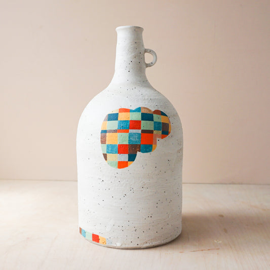 Hand built bottle vase with checks
